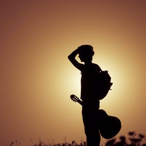 Preview wallpaper musician, silhouette, guitar, musical instrument, sunset