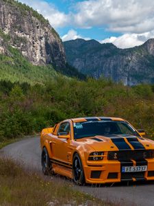 Preview wallpaper mustang shelby, car, muscle car, orange, road, mountains