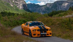 Preview wallpaper mustang shelby, car, muscle car, orange, road, mountains