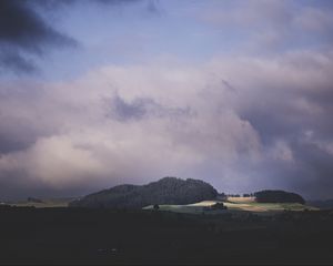 Preview wallpaper nature, mountains, field, trees, sky, clouds