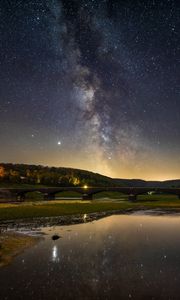 Preview wallpaper nebula, bridge, lake, stars, reflection
