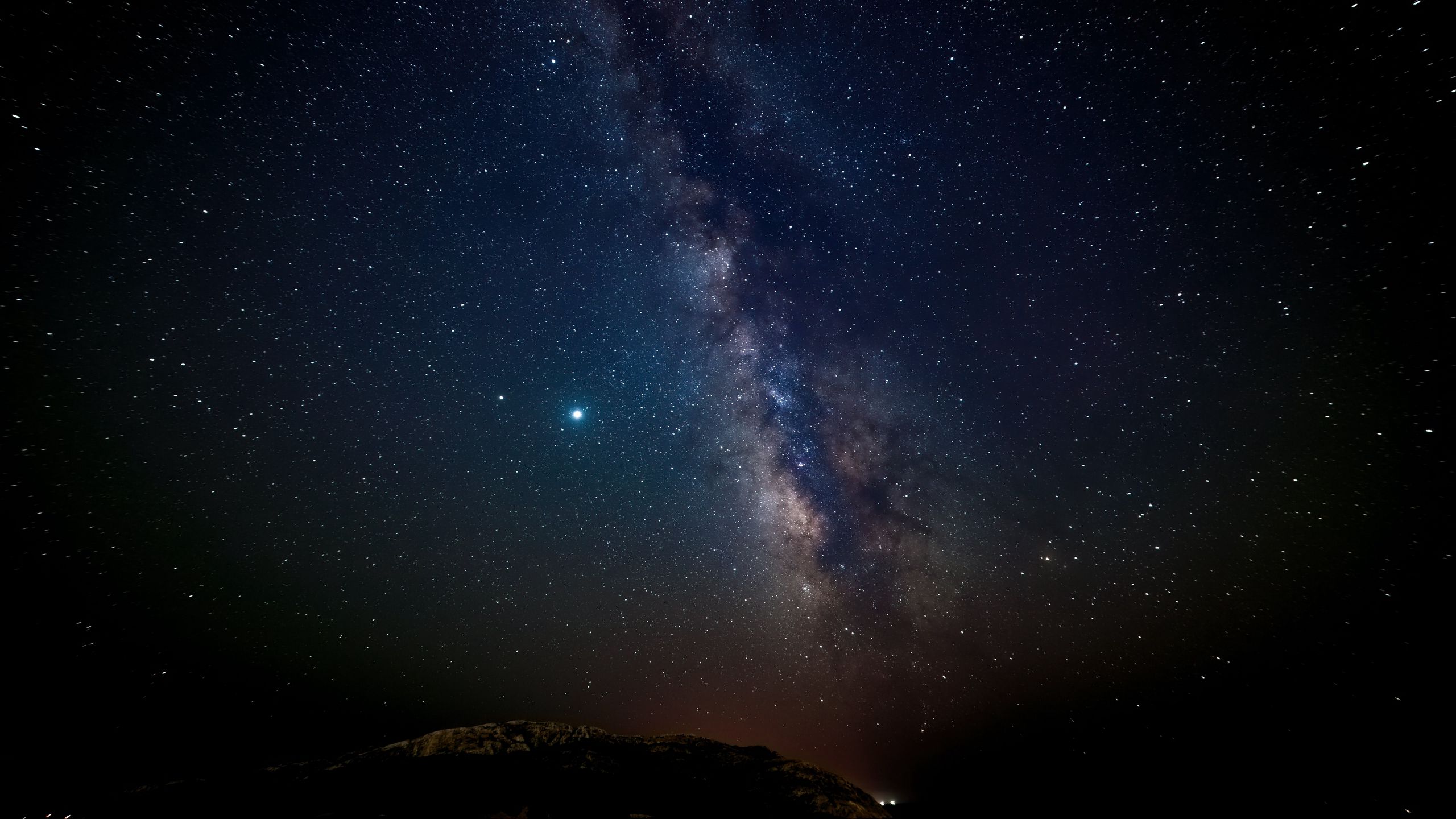 Download wallpaper 2560x1440 nebula, starry sky, stars, hill, night