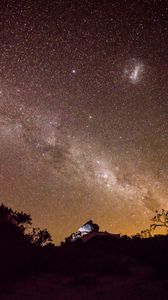 Preview wallpaper nebula, stones, bushes, stars, starry sky