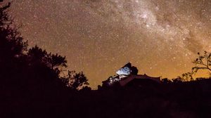 Preview wallpaper nebula, stones, bushes, stars, starry sky