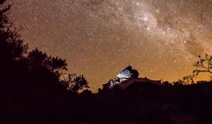 Preview wallpaper nebula, stones, bushes, stars, starry sky