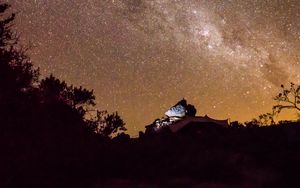 Preview wallpaper nebula, stones, bushes, stars, starry sky