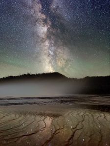 Preview wallpaper nebula, trees, silhouette, lake, starry sky