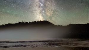 Preview wallpaper nebula, trees, silhouette, lake, starry sky