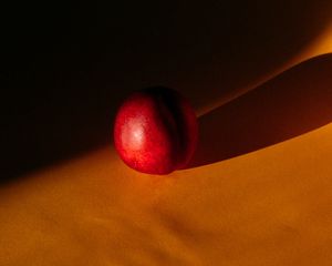 Preview wallpaper nectarine, fruit, shadow, dark