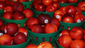 Preview wallpaper nectarines, fruit, baskets