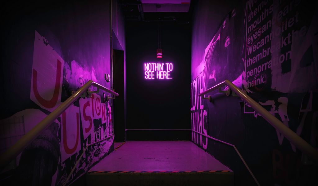 1024x600 Wallpaper neon, inscription, wall, purple, backlight