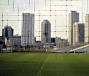 Preview wallpaper net, field, buildings, blur