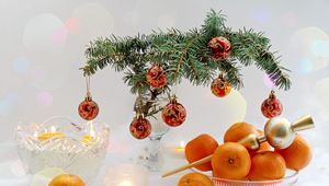 Preview wallpaper new year, christmas, food, tangerines, branch, candles, table