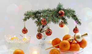 Preview wallpaper new year, christmas, food, tangerines, branch, candles, table