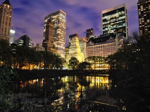 Preview wallpaper new york city, center, new york, city, houses, buildings, trees, clouds, cloudy, manhattan, lake, light, lights, night city, beautiful, beautiful sky, pond, reflection
