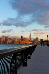 Preview wallpaper new york, city, night, water, sunset, skyscrapers, embankment