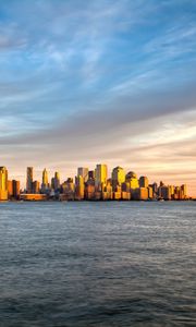 Preview wallpaper new york, manhattan, island, sea, waves, water, landscape, view, review, sky, evening, sunset, clouds