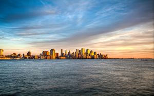Preview wallpaper new york, manhattan, island, sea, waves, water, landscape, view, review, sky, evening, sunset, clouds