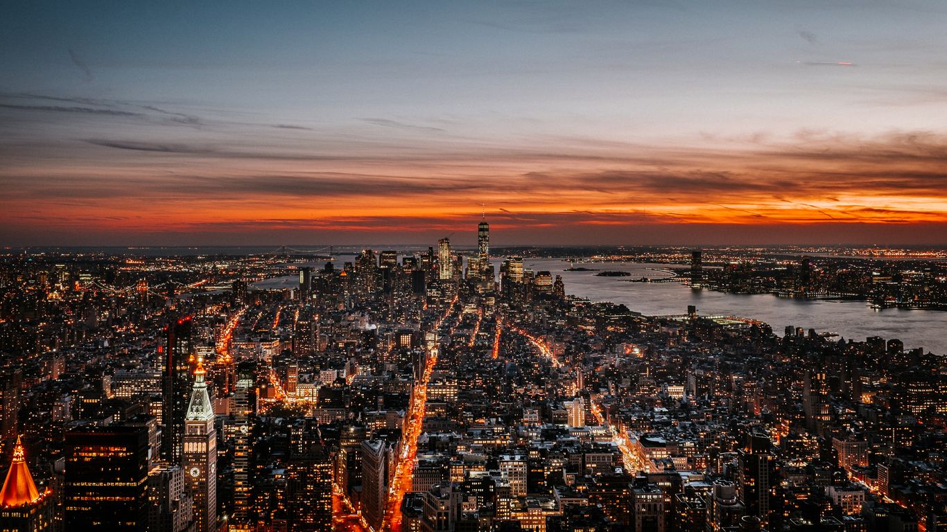 Bạn đang tìm kiếm một hình nền đẹp với kích thước 1366x768? Thì New York đêm với skyline tuyệt đẹp, bầu trời đầy sao sẽ là lựa chọn hoàn hảo cho bạn. Hãy tải về nền trời New York này và sử dụng nó trên máy tính của mình ngay!