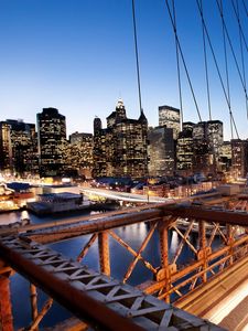 Preview wallpaper new york, sunset, bridge, skyscrapers, piers, lights