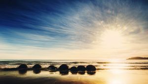 Preview wallpaper new zealand, ocean, sunrise, rocks