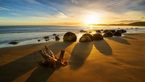 Preview wallpaper new zealand, ocean, sunrise, rocks, coastline