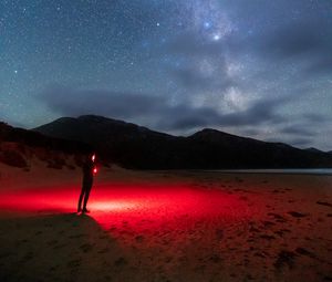 Preview wallpaper night, beach, silhouette, light, starry sky