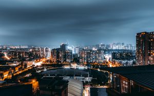 Preview wallpaper night city, aerial view, architecture, buildings, lights, thunderstorm