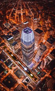 Preview wallpaper night city, aerial view, architecture, buildings, towers, skyscrapers, roofs