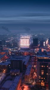 Preview wallpaper night city, aerial view, buildings, snow, winter