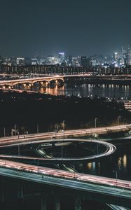 Preview wallpaper night city, aerial view, city lights, road, lighting