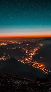 Preview wallpaper night city, aerial view, mountains, lights, starry sky