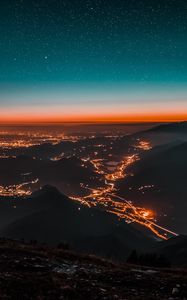 Preview wallpaper night city, aerial view, mountains, lights, starry sky