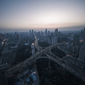 Preview wallpaper night city, aerial view, road, metropolis