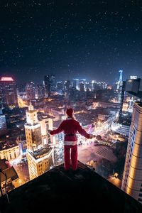 Preview wallpaper night city, aerial view, santa claus, loneliness, roof