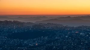 Preview wallpaper night city, aerial view, sunset, sky, fog