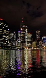 Preview wallpaper night city, architecture, buildings, water, reflection, lights