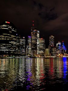 Preview wallpaper night city, architecture, buildings, water, reflection, lights
