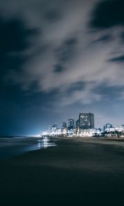 Preview wallpaper night city, beach, night, sky, overcast, clouds