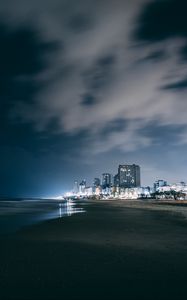 Preview wallpaper night city, beach, night, sky, overcast, clouds