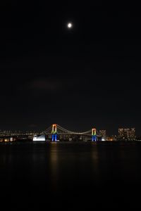 Preview wallpaper night city, bridge, lights, moon, water