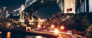 Preview wallpaper night city, bridge, river, movement, turn