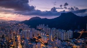 Preview wallpaper night city, building, lights, mountains
