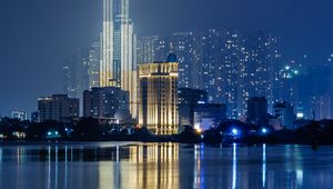 Preview wallpaper night city, buildings, architecture, water, reflection