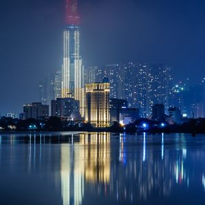 Preview wallpaper night city, buildings, architecture, water, reflection