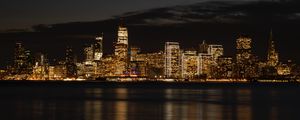 Preview wallpaper night city, buildings, coast, metropolis, panorama