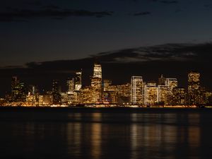 Preview wallpaper night city, buildings, coast, metropolis, panorama