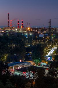 Preview wallpaper night city, buildings, factory, road, trees