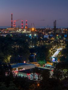 Preview wallpaper night city, buildings, factory, road, trees