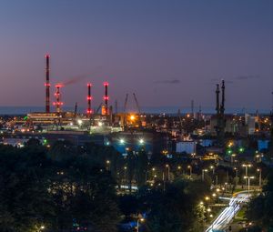 Preview wallpaper night city, buildings, factory, road, trees